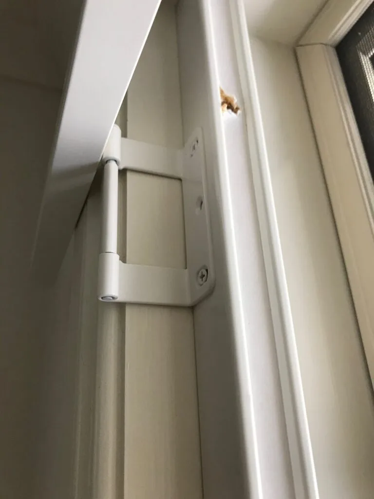 5 install hang strip hinge side-min Fixing the hinged side hang strip at the top of the opening