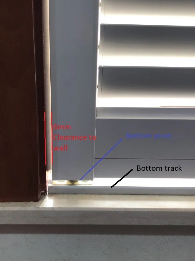 End aluminium shutter panel fitted into top and bottom pivot points